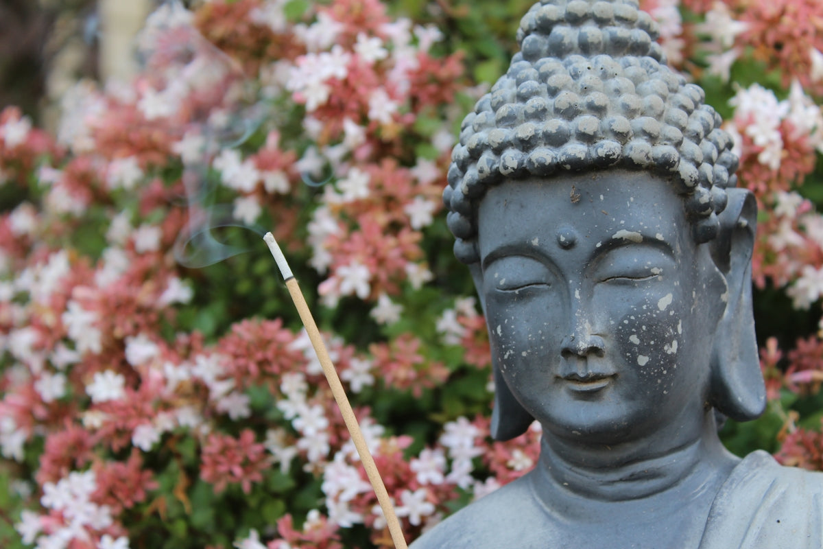 gray concrete buddha statue during daytime