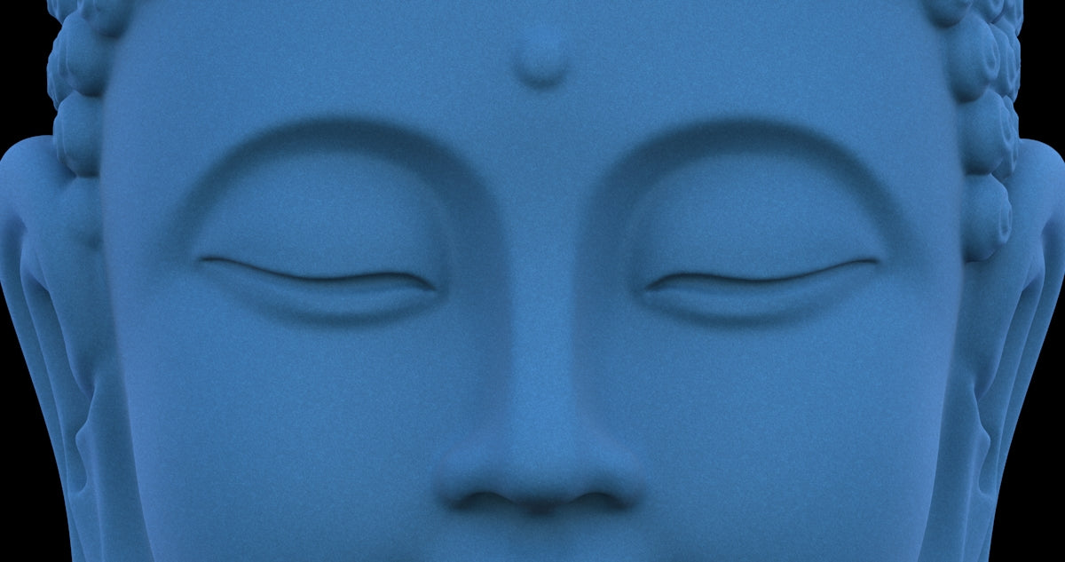 Close up of a serene blue buddha statue